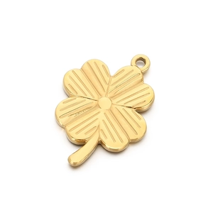 Polished gold four-leaf clover pendant in stainless steel with textured metal finish