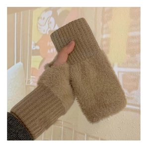 Close-up of beige plush fingerless knit gloves with soft ribbed cuffs for women