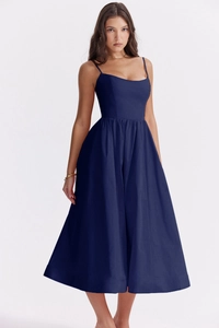 Close-up of the square neckline and thin straps on this dark blue midi slip dress