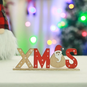 Close-up of a festive wooden XMAS sign with Santa Claus details and warm bokeh lighting