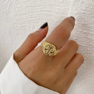 Irregular hammered texture S925 sterling silver ring in gold finish worn by model