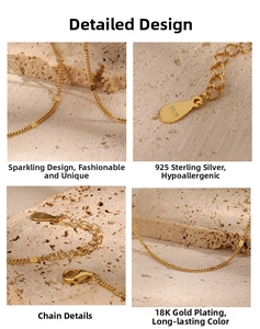 Macro detail of S925 sterling silver stamp and 18K gold plated chain with lobster clasp