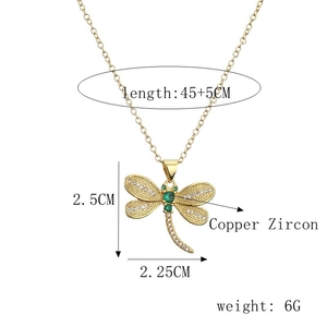 Detailed view of dragonfly pendant necklace with size specs and copper zircon material info