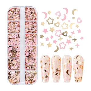 Detail view of 12-slot box with gold and pink heart star sequins for DIY nail art