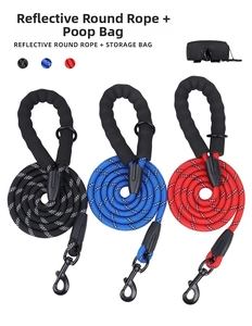 Close-up of reflective round dog leash set with foam handle and waste bag dispenser