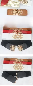 Close-up of elastic waist belt with ornate golden double flower metal buckle and faux leather