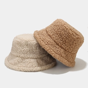 Thick lamb wool bucket hat for women in beige and caramel colors, warm winter style