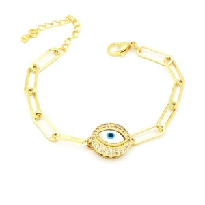 Gold paperclip chain bracelet with diamond-paved evil eye pendant on white background