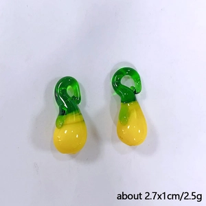 Detailed view of yellow and green glass gourd pendants with 2.7x1cm size specifications
