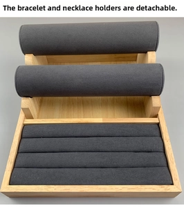 Detail of detachable bamboo jewelry stand with grey microfiber rollers and ring tray