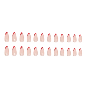 Almond-shaped press-on nails with red french tips and gold glitter wave patterns