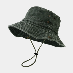 Detail of outdoor sun hat with washed fabric texture and side ventilation eyelets