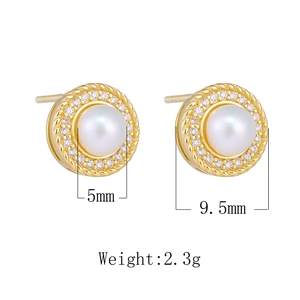 Detail view of 9.5mm vintage pearl stud earrings with gold rope texture and zircon accents