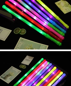 Colorful LED glow sticks in green red pink purple blue and yellow for concert parties