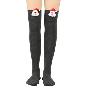 Detailed knit texture of dark grey over-knee socks with Santa Claus patch decoration