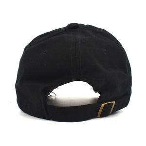 Detail view of the black cotton baseball cap back with adjustable bronze metal buckle