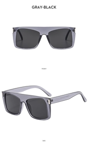 Front and side views of oversized flat top Y2K sunglasses with transparent gray frames
