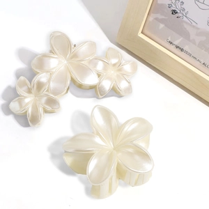 Elegant pearlescent lily flower hair claw set with large clip and side floral accessories
