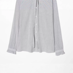 Women's blue and white striped long sleeve shirt with elegant ruffle cuffs and buttons