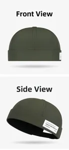 Detail view of olive green docker hat with retro cloth label and quick-dry fabric