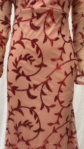 Detailed view of red sequin vine embroidery on a slim fit mesh party evening dress