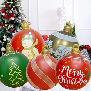 Inflatable Christmas ball decorations with festive patterns and Merry Christmas text