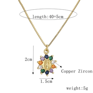 Detail of copper gold necklace with colorful zircon Virgin Mary pendant and box chain