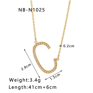 Detail showing letter C pendant dimensions 2.8x1.5cm on 18k gold plated chain