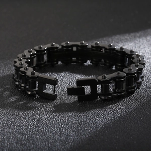 Detail of black matte stainless steel bike chain bracelet with mechanical links