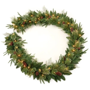 Close-up of 9FT green Christmas garland with natural pine cones and warm LED lights