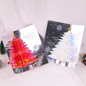 3D holographic pop-up Christmas cards featuring red and silver festive tree designs