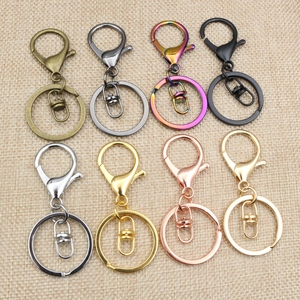 Matrix display of multi-color metal lobster clasp keychain rings in eight finishes