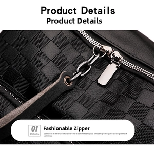 Close-up of black checkered embossed leather with silver metal zipper and ring details