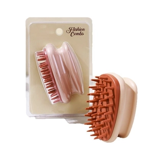 Manual scalp massager shampoo brush with silicone bristles and ergonomic beige handle