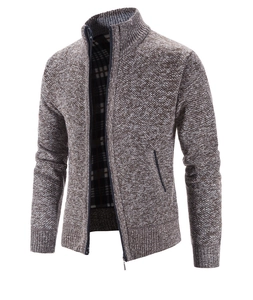 Detailed view of men's knit cardigan with warm plaid fleece lining and zipper closure