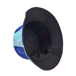 Detail of multi-color bandana paisley bucket hat with blue prints and black inner lining