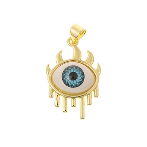 Detailed close-up of golden Evil Eye pendant with blue iris and a teardrop accent