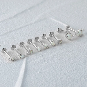 Detailed close-up of S925 sterling silver flat-back earrings with opal and zircon inlays