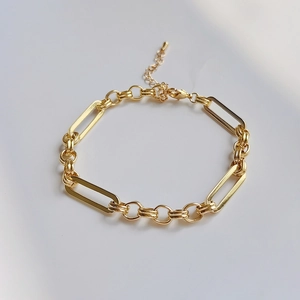 Bohemian gold chain bracelet featuring interlinked geometric oval and round links