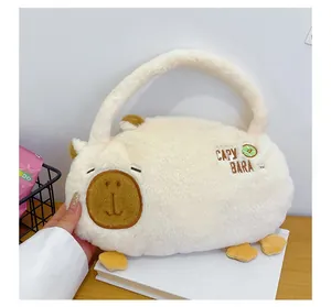 Detailed close-up of plush Capybara tote bag featuring embroidery and soft faux fur texture