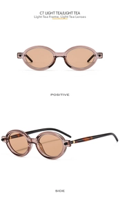 Detail view of oval retro sunglasses in light tea color with tortoise shell temples