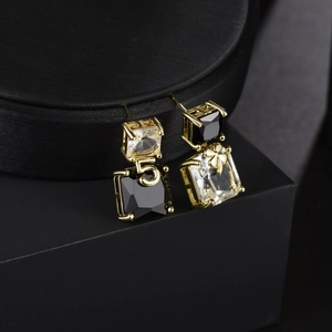 Asymmetric drop earrings with black and clear crystals, gold metal number 5 charms