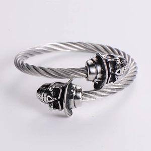 Adjustable stainless steel cable bracelet with gothic skull wearing top hat charms