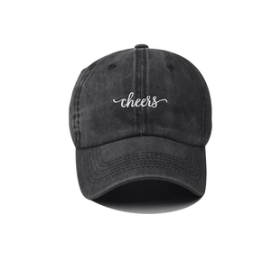 Classic washed black cotton baseball cap with white cheers embroidery on plain white background