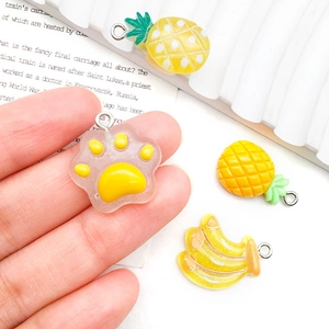 Cute yellow resin charms featuring cat paw, pineapple and banana for DIY jewelry making