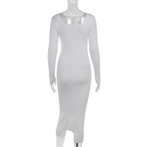 Detail view of the ribbed knit texture and hollow straps on white slim maxi dress