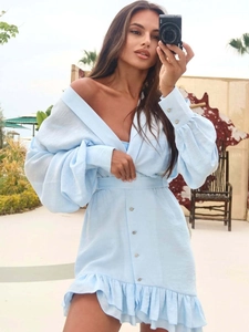 Light blue V-neck mini dress with lantern sleeves and tiered ruffle hem detail