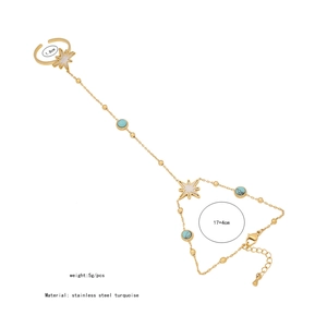 Chaîne de main en acier doré avec cœur turquoise et détails des dimensions précises