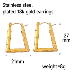 Detailed view of 18k gold plated stainless steel bamboo hoop earrings with size measurements