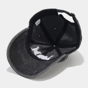 Washed cotton baseball cap in dark gray with embroidered DAD MOM lettering and 100% cotton label